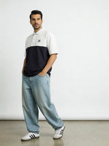 Contrast Oversized polo with unique collar branding